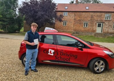 image of happy pupil who passed their driving test in Banbury with Cole's Driving School